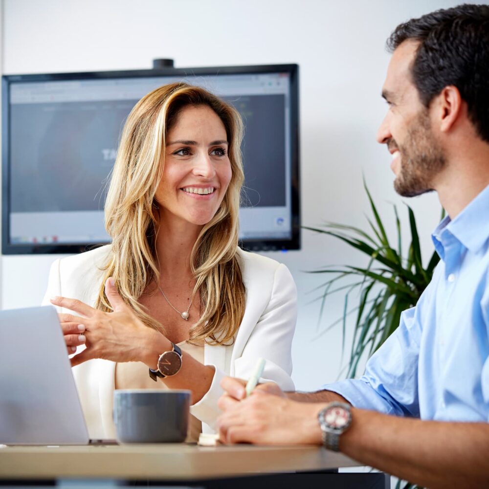 portrait-smiling-young-woman-using-smart-phone (1)